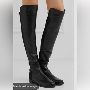 Grey suede Stewart Weitzman 50/50 boot.